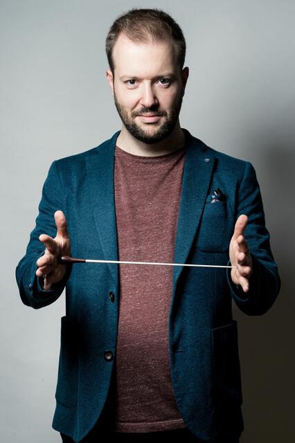 Andy Schreck (www.andyschreck.de), Gymnasiallehrer mit Fach Musik und Dirigent verschiedener Blasmusikkapellen.